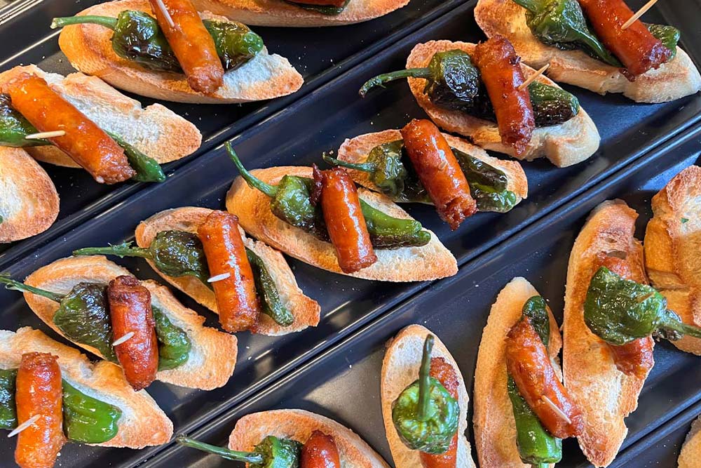 chistorra and padron peppers from out tapas team building activity